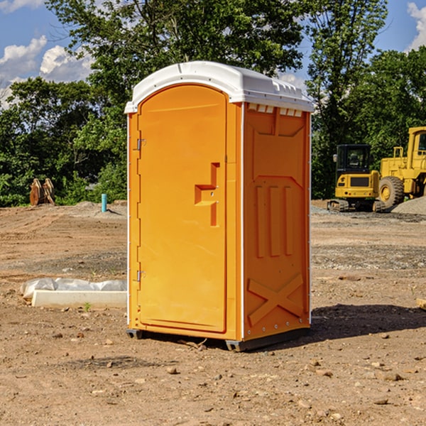 how often are the portable restrooms cleaned and serviced during a rental period in Williams IL